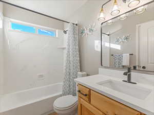 Full bathroom featuring vanity and shower / bath combo