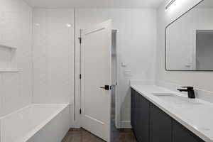 Full bathroom with vanity and shower / tub combination