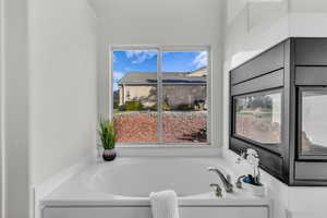 Full bath with a garden tub