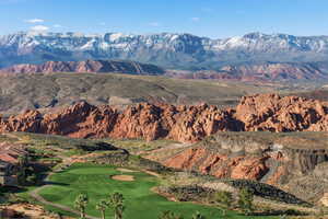 View of mountain background with a golf course