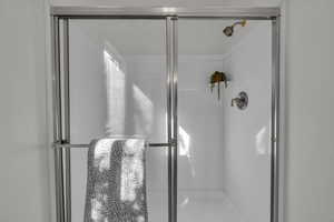 Full bathroom with a stall shower