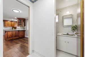 Entrance from garage, half bath to the right, laundry to the left, entering to the Dining, Kitchen area