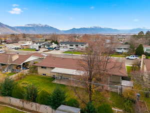 Aerial view of residential area with a mountain backdrop