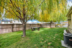 View of fenced backyard