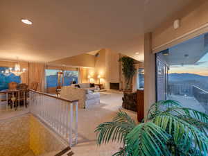 Entry way looking into living room and out front windows to the Salt Lake Valley