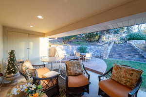 Covered patio looking out to backyard