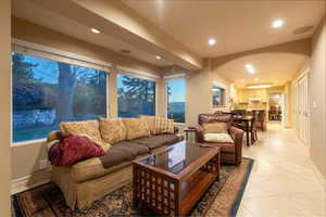 Lovely family room space off kitchen with large windows