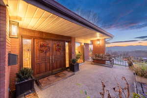 Front door with wonderful wrap around patio and city views