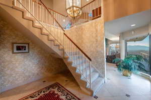 Entry way with lovely staircase and city vies