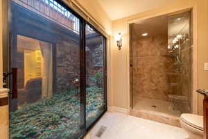 Lovely atrium surround by primary bedroom/bathroom suite