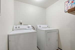 Laundry area featuring washing machine and dryer