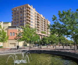 View of apartment building / complex with a water view