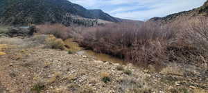 Mountain view with a nearby body of water