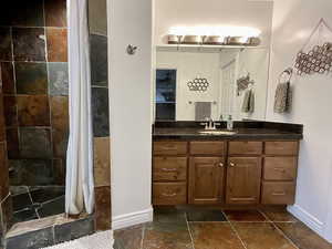 Primary ¾ bathroom featuring fresh paint