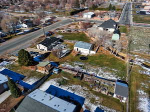 Aerial view of property's location featuring nearby suburban area