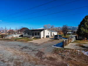 View of property exterior with driveway