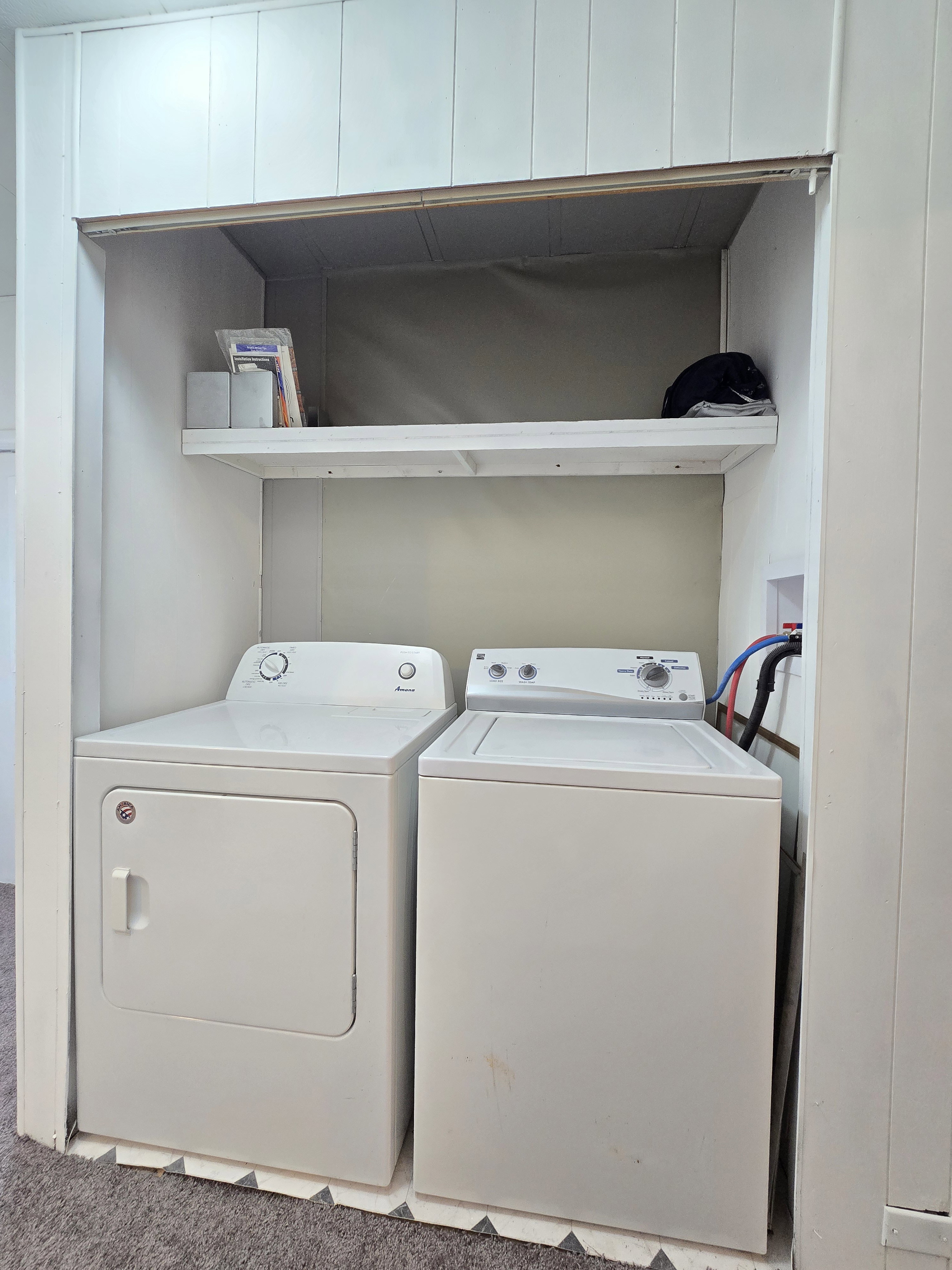 Laundry area featuring separate washer and dryer
