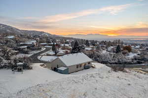 Snowy aerial view with a mountain view
