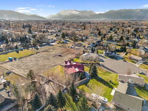 Aerial view of residential area featuring mountains