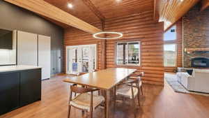 Dining space featuring french doors that exit onto a large, covered, backyard deck