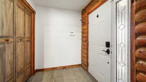 Entrance foyer with baseboards