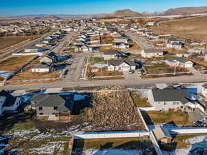 Aerial perspective of suburban area featuring mountains