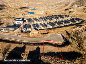 Aerial perspective of suburban area featuring a desert landscape