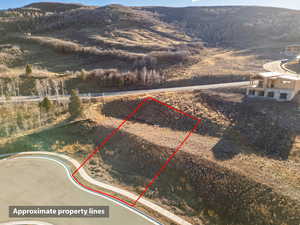View of property location with property boundaries highlighted and a mountainous background
