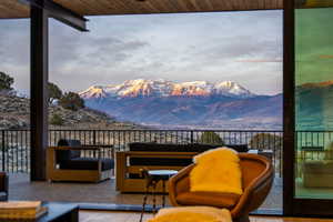 Living room through nano doors to outdoor living space.