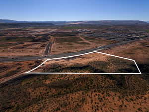 Overview of rural landscape with mountains and property boundaries highlighted