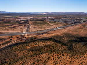 Overview of rural landscape with a mountainous background and a desert landscape
