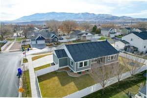 Aerial perspective of suburban area featuring mountains