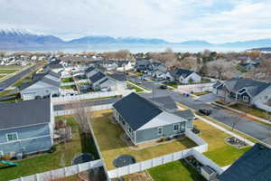 Aerial view of residential area featuring a mountain backdrop