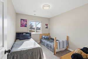 Spacious room with a larger walk in closet and great natural light.