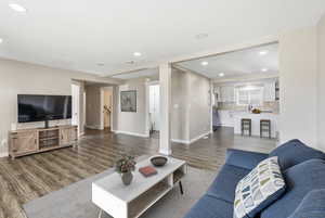 Living area featuring recessed lighting and wood finished floors