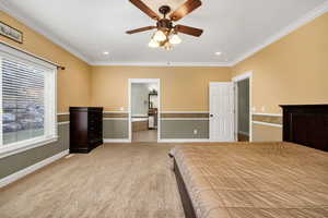 Bedroom featuring ornamental molding, light colored carpet, ceiling fan, recessed lighting, and ensuite bath