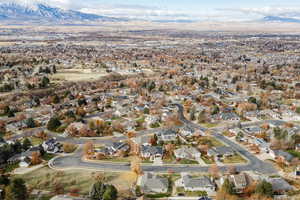 View of property location with a mountainous background and nearby suburban area