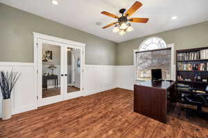 Office space with french doors, wood finished floors, ceiling fan, a wainscoted wall, and recessed lighting