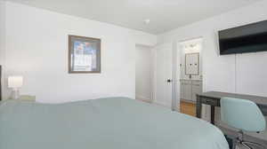 Bedroom featuring connected bathroom