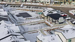Snowy aerial view with a residential view