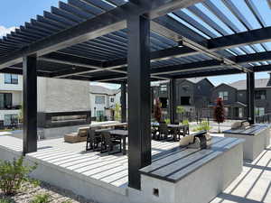 View of patio featuring outdoor dining space, a residential view, and a pergola