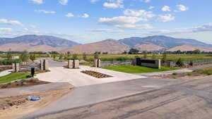 View of mountain backdrop with rural landscape