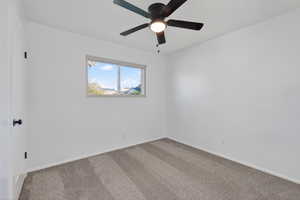 Bedroom New carpet flooring and ceiling fan