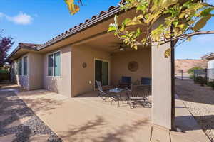 View of patio with ceiling fan