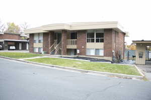 View of building exterior featuring stairs
