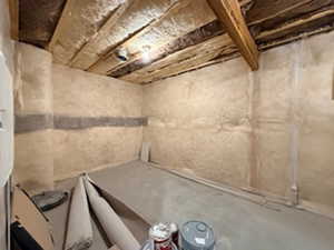 Misc room featuring a sauna and unfinished concrete floors