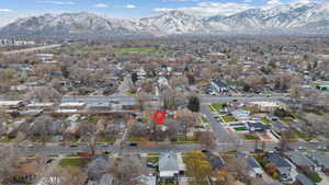 View of property location with nearby suburban area and a mountainous background