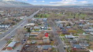 View of property location with nearby suburban area and a mountainous background