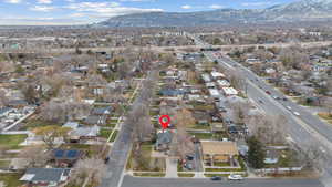 View of property location featuring a mountainous background and nearby suburban area