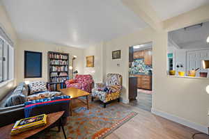 Living room featuring beam ceiling